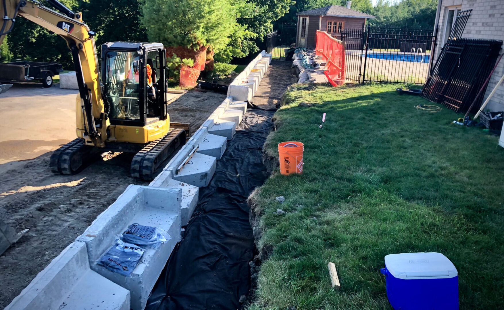 Construction site with excavator and materials